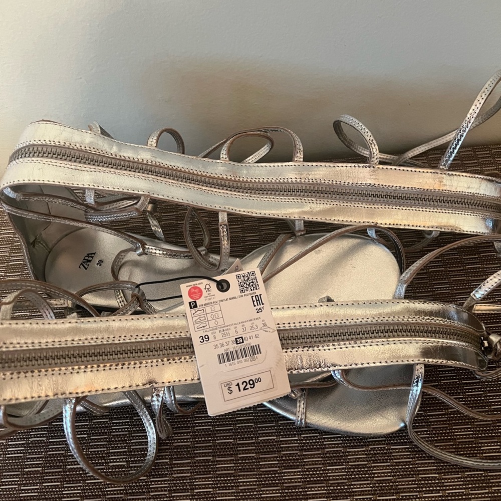 NWT. Zara Silver Strappy Flat Sandals with Buckle Details. Size 8